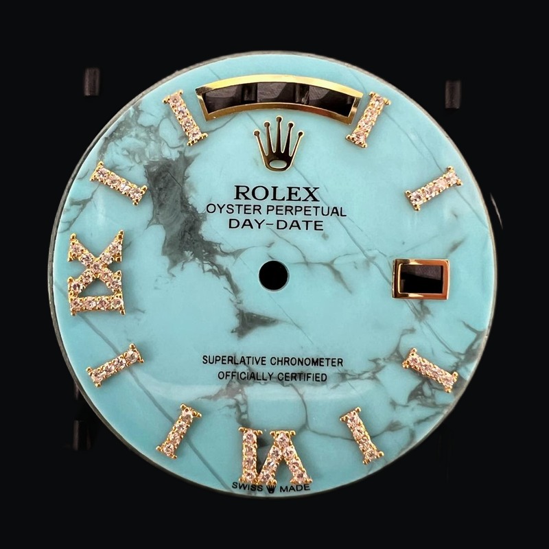 Turquoise Day-Date dial with rose gold Roman numerals